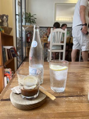 Iced coffee and water with lemon  at Billy Brunch Sevilla in Sevilla