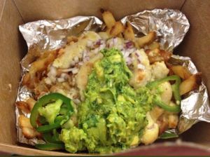 vegan chili cheese fries to go!  at Mohawk Bend in Los Angeles