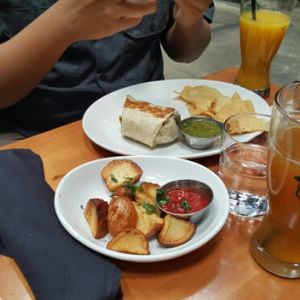 Breakfast burrito and potatoes at Mohawk Bend in Los Angeles