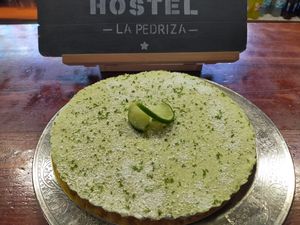 Tarta crudivegana de coco, lima y frutos secos. at Hostel La Pedriza in Manzanares El Real