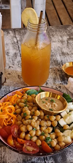 Buddha bowl and Bocas hot sauce with lemonade at El Patio in Bocas Del Toro