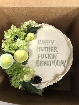 birthday cake for my husband’s b(earth)day. decorated with the color scheme i choose with flowers, fresh berries, and little mushrooms! obsessed is an understatement   at The C Word Cakery in Independence
