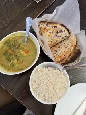 Vegetable Korma, Onion Kulcha(SO GOOD), and ricee  at Masala Desi Cafe in Burlingame