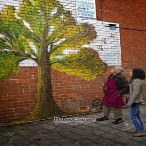 Bruce and Catalina inspect the new mural.. He is a patron of the arts, too! at Elwood Organic in Elwood