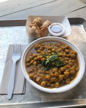 Above  - mini vegan samosas with a delicious tamarind chutney.
Below - Vegan channa masala topped with cilantro at Curry In a Hurry in Raleigh