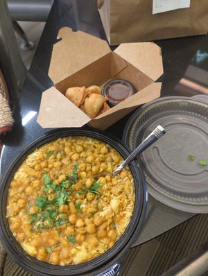 The chickpeas and rice were wholesome and filling, and a little spicy. The samosas were fresh and crisp on the outside and soft and warm on the inside, not spicy at Curry In a Hurry in Raleigh