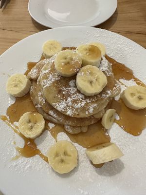 Banana and maple syrup pancakes 🥞 🤤  at Meow Cafe in Epping