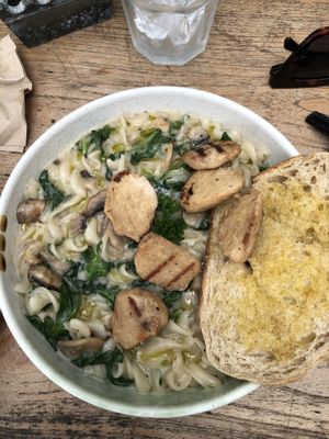 Mushroom truffle pasta with extra grilled chicken  at Burgreens Canggu - Healthy Plant-Based Eatery in Canggu