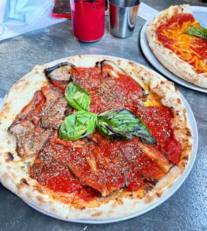 Robert Plant (eggplant) and Ol’ School with vegan cheese (margherita)  at Rossonero Pizza in Maylands