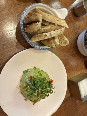 Avocado toast, removed the egg. It comes deconstructed like this, I had to get more bread to finish all the avocado though—very generous portion!   at Unconventional Diner in Washington