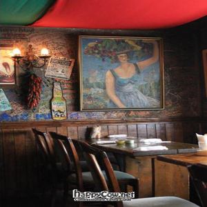 Inside. Pretty dark but great atmosphere. The walls are filled with peoples notes, names, year ect. Such a fun vibe.  at El Pancho in Osaka