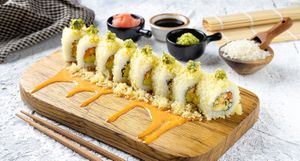 CRISPY CADO
(Vegan friendly, Spicy) Pickled carrot and cucumber, spicy mayo tanuki, rolled with avocado and topped with jalapeno dip. at Dip Dash in Dubai