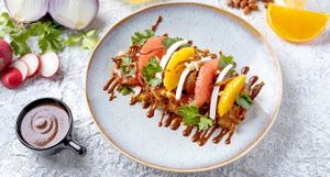 HELLO POMELO
(Nuts) Refreshing pomelo and grapefruit, hand tossed with pink radish, tender coconut, coriander and fried onions spruced up with peanut n miso soya dip. at Dip Dash in Dubai