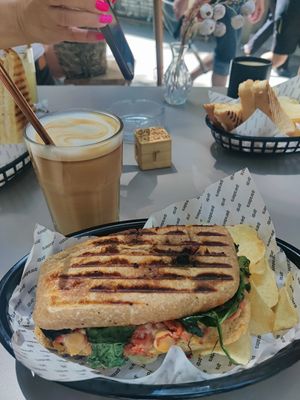 Iced latte and hummus focaccia at Paradero in Barcelona