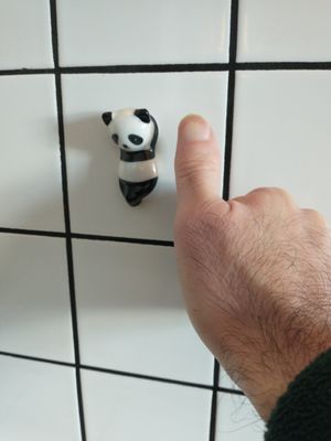Tiny pandas adorn the wall. at Panda Cantina - Príncipe Real in Lisbon