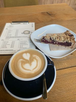 Flat white and cherry pie  at Goosebumps Coffee Lab in Budapest