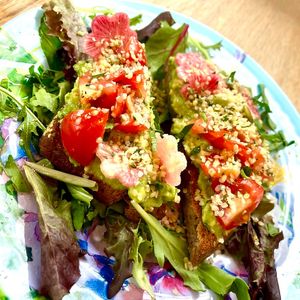 Gluten free house made toasted bread with mashed avocado, cilantro vinaigrette, cherry tomato, hemp, pumpkin and sunflower seeds. Served with fresh leaves and moderna glaze at Botanika Cafe in Ridgefield