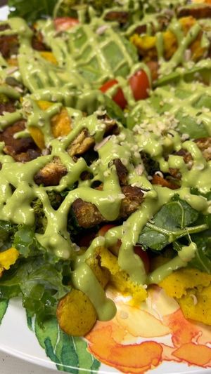 NEW! Breakfast savory goddess bowl! Kale, Roasted broccoli, avocado, mung beens scramble, bacon tempeh, cherry tomatoes, sweet potatoes hash, green goddess tahini dressing at Botanika Cafe in Ridgefield