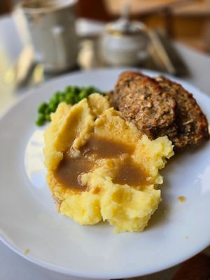 Flavorful lentil loaf with mashed potatoes at Café In The Ghetto in Brno