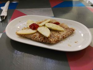 Buckwheat pancake filled with jam and topped with apples. at Dream House in Sofia