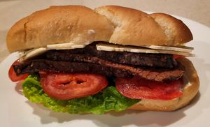 Our cold deli-style beef-like seitan sandwich with your choice of cheese, lettuce, tomatoes, and red onions at MF Good Food in Riverside