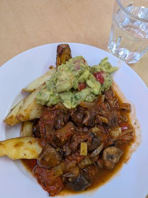 Mushroom chilli with wedges and guacamole at Food Works Sharrow in Sheffield