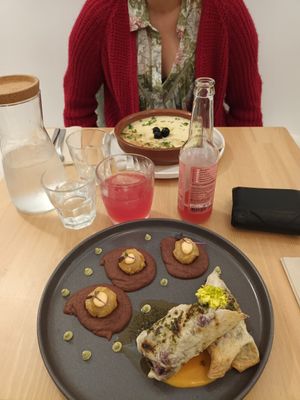 Burrito with guac, hibiscus meat, fried milanese bana and spicy red bean cream at A Minha Avó in Lisbon