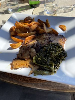 Seitan, rapini and fries   at Rama Beach Cafe in Castel Volturno
