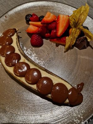 Grilles banana with melted dark chocolate. at Hornox in Zermatt