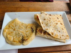 Vegan veggie pupusa and vegan tinga quesadilla at 3 in 1 Restaurant in Indianapolis