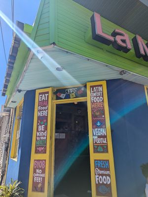 Entrance mentions their vegan menu! at La Macarena in New Orleans