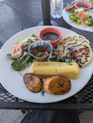 Vegan tamale and pupusa platter at La Macarena in New Orleans