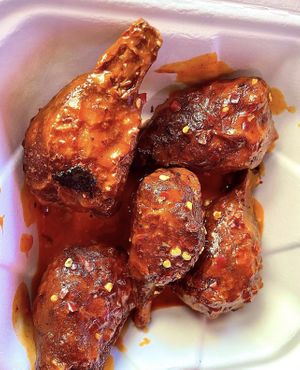spicy garlic Buffalo sauce wings  at Project Pollo in Dallas