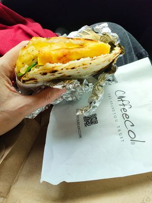 Morning Sunshine arepa -  plant based eggs, sauteed onions, spinach and sweet plantains so yummy! at Coffeecol in Teaneck