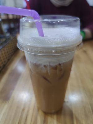 Iced Oat Milk Tea at Vegetarian in the Golden Age in Vientiane