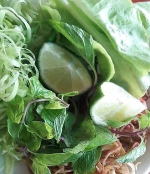 some extra to the soup at Vegetarian in the Golden Age in Vientiane