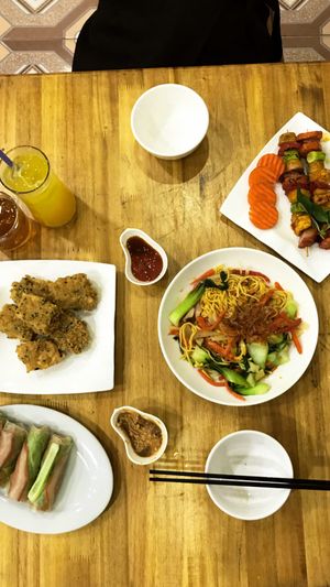 Bbq, fried tofu, fried noodels and spring rolls  at Vegetarian in the Golden Age in Vientiane