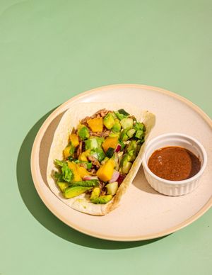 Jamaican Jerk Taco made from Jackfruits, served with fresh mangos & a tasty sauce.  at Gaia Healing Meals in Quezon City