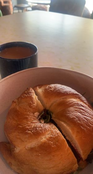 Bagel - the lot (ate the pretzels and pickle). Hot coffee with oat milk.  at Bury Me Standing in Cairns