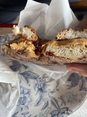 Peanut butter and jelly on a cinnamon bagel  at Bury Me Standing in Cairns
