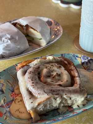 Bagel with cream cheese and cucumber, cinnamon bun   at Bury Me Standing in Cairns