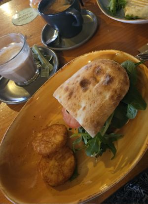 Brewed chai latte + schnitzel burger with hashbrowns at Freudian Sip in Leura