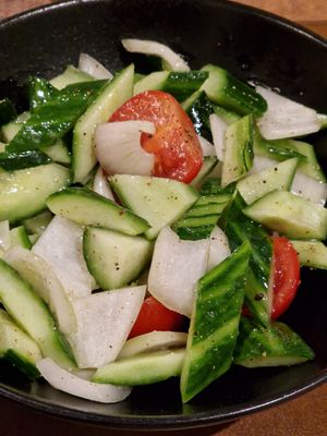 Cucumber, onions and tomatoes salad. at Naan Bar in Valletta