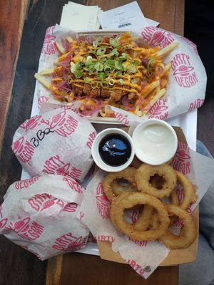 Dirty fries with sriracha sauce, onion rings, bbq stack burger and the garlicious burger! at Dirty Vegan - Barcode Street Food in Oslo