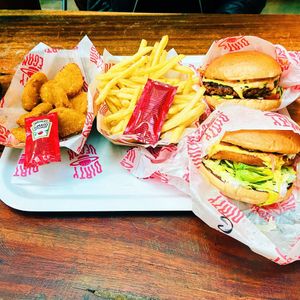 Chicken burger (garlicious), great western burger (I think), nuggets and chips  at Dirty Vegan - Barcode Street Food in Oslo