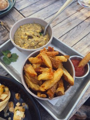 Fries and mushroom grits   at Cinder Restaurant in Westerly