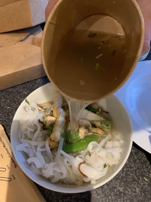 Soup & ingredients for pho packaged separately   at Pho Me in Hitchin