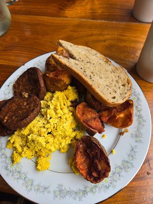 Sunday brunch platter (tofu scramble, vegan sausage, rye bread, and crispy potatoes) at Elk Creek Cafe and Aleworks in Millheim