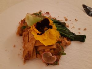 Main / Asian noodles with tempeh at MUDRA Plant Based  in Madrid