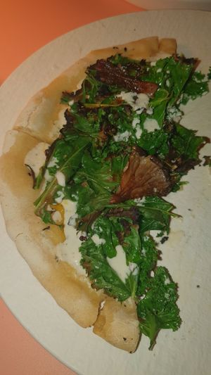 Pizza trufada at MUDRA Plant Based  in Madrid